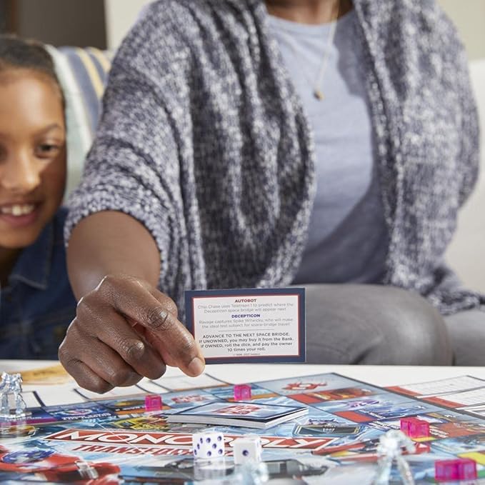 Monopoly: Transformers Edition Board Game for 2-6 Players Kids Ages 8 and Up Includes Autobot and Decepticon Tokens