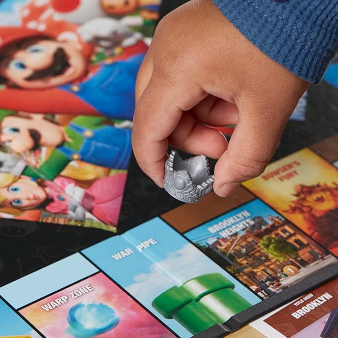 Monopoly Board Game Based on The Super Mario Bros. Movie - Family Game for Super Mario Fans - Includes Bowser Token - for 2 to 6 Players - Age: From 8 Years Old