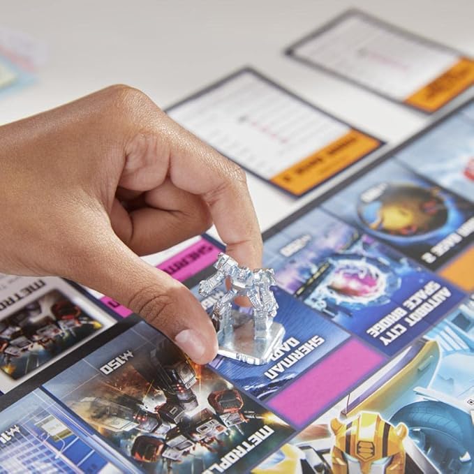 Monopoly: Transformers Edition Board Game for 2-6 Players Kids Ages 8 and Up Includes Autobot and Decepticon Tokens
