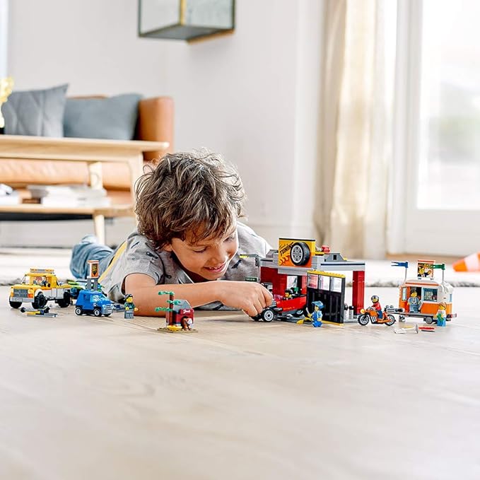 LEGO City Tuning Workshop 60258 Features a Toy Garage Car Shop Camping Trailer Motorcycle Crane and Tow Truck in One Fun Playset Makes a Great Gift for Kids