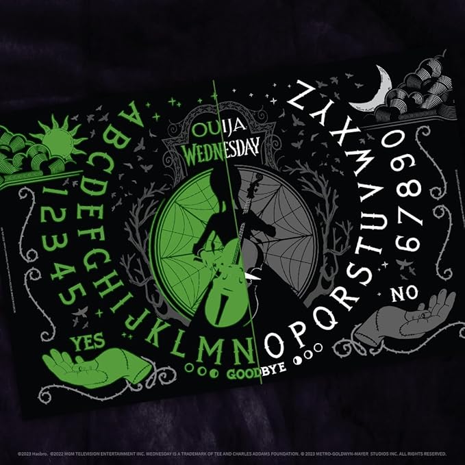 Ouija: Wednesday | Inspired by the Popular Original Series Wednesday | Collectible Classic Ouija Board Game | Officially Licensed Game and Merchandise | Glow in the Dark Board | 2-4 Players Ages 8+