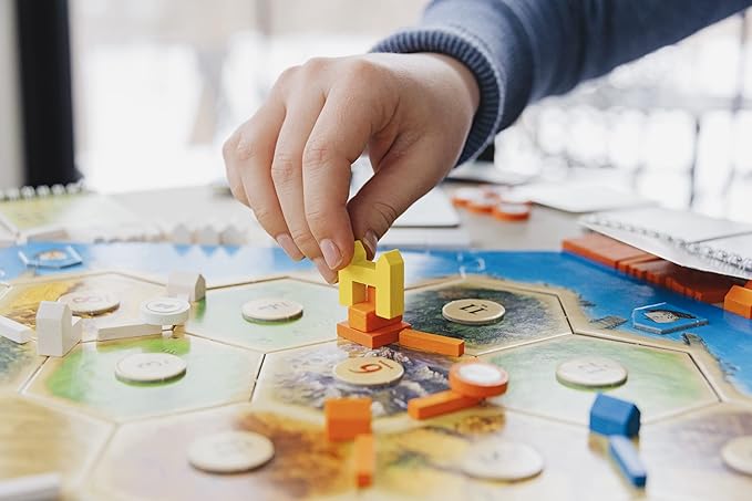CATAN Cities &amp Knights Board Game Expansion - Enhance Your CATAN Experience with Intriguing New Challenges! Strategy Game for Family Ages 12+ 3-4 Players 90 Min Playtime Made by CATAN Studio
