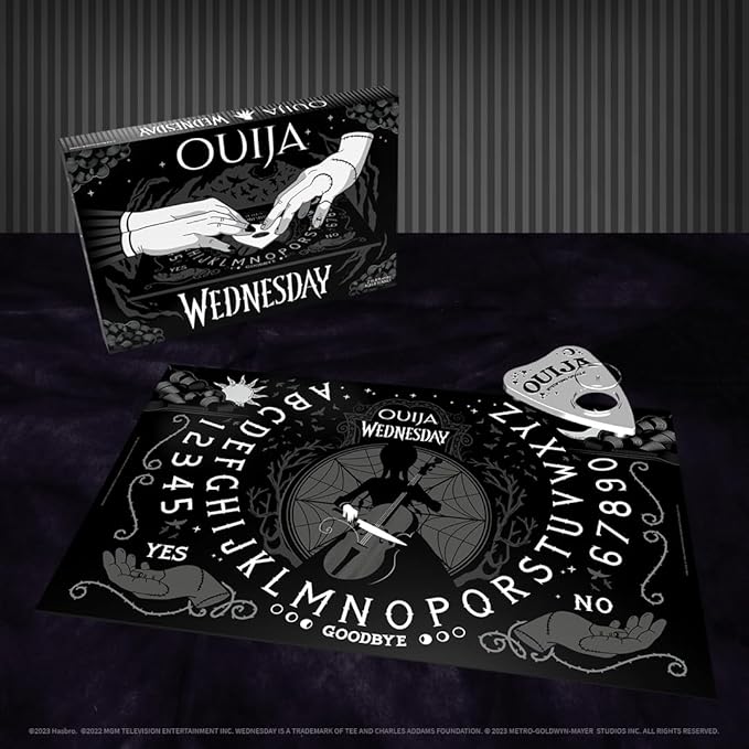 Ouija: Wednesday | Inspired by the Popular Original Series Wednesday | Collectible Classic Ouija Board Game | Officially Licensed Game and Merchandise | Glow in the Dark Board | 2-4 Players Ages 8+