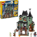 LEGO Creator 3 in 1 Haunted Mansion Building Toy for Kids - Halloween Building Blocks &amp Learning Toy for Girls &amp Boys Ages 9+ - Build a Haunted House Train or Ship - Gift for Birthdays - 31