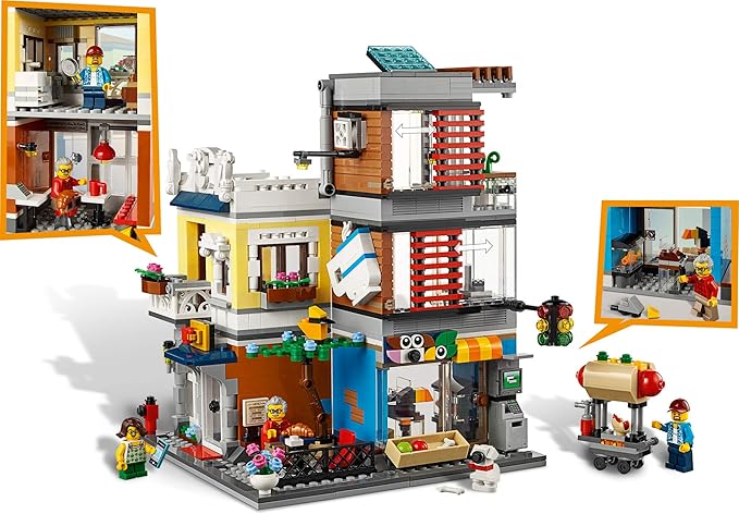 LEGO Creator 3 in 1 Townhouse Pet Shop &amp Café 31097 Toy Store Building Set with Bank Town Playset with a Toy Tram Animal Figures and Minifigures (969 Pieces)