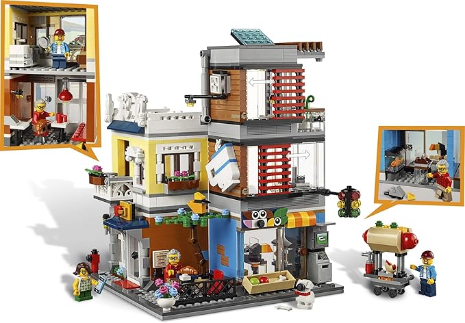 LEGO Creator 3 in 1 Townhouse Pet Shop &amp Café 31097 Toy Store Building Set with Bank Town Playset with a Toy Tram Animal Figures and Minifigures (969 Pieces)