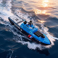 22 Inch 56CM Remote Controlled Warship Battleship Aircraft Carrier 15km/h 2.4G 8WD RC Boat Spaying Water LED Walk On Water Lakes Pools for 14Y+ Blue (2 Water-Cannons 1 Shooting &amp1 No-Shooting)